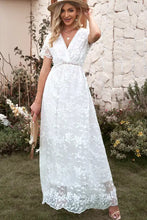 Embroidered short sleeve surplice neck maxi dress in white lace with floral embroidery and V-neckline