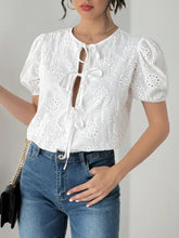 White eyelet tie-front bodysuit in stretch viscose