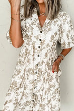 Cream floral print button-down dress with short sleeves and pockets