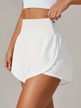 White high-waisted tennis skirt with pockets and crotch seam