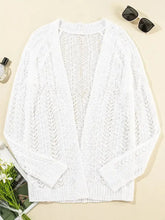 White lace and cable knit cardigan with open front, long sleeves, and gold hardware