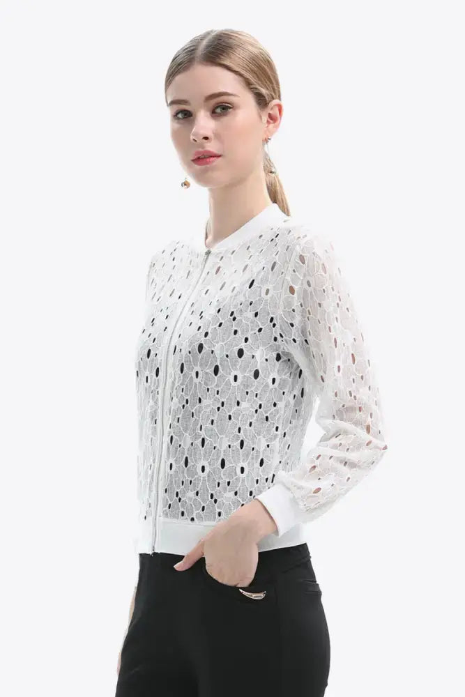 White lace bomber jacket with black cutouts for effortless elegance