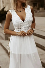 White lace chiffon sleeveless maxi dress with pleated skirt and deep V-neckline