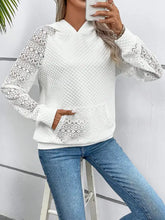 White lace openwork hoodie with geometric sleeves and kangaroo pocket