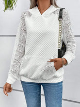 White lace openwork hoodie with quilted geometric sleeves and kangaroo pocket