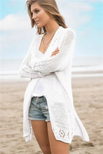 White long sleeve cardigan with v-neck and side slits