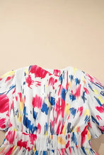 Short puff sleeve tiered dress with abstract multicolored floral print