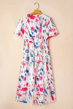 White short puff sleeve tiered midi dress with abstract floral print