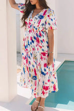 White short puff sleeve tiered midi dress with abstract tie-dye print