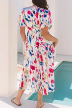 White short puff sleeve tiered midi dress with colorful abstract print
