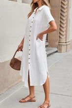 White short sleeve button-down shirt dress with V-neck and high-low hem