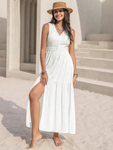 White sleeveless maxi dress with V-neck, thigh-high slit, and stretch waist