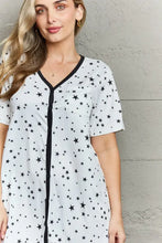 White star pattern sleepwear dress with black trim and buttons