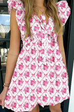 White summer dress with pink floral ribbon pattern