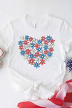 Women’s white t-shirt with red, white, blue floral heart design on white background