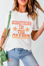 White T Shirt with Orange Text for Women