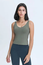 Olive green ribbed racerback tank top with v-neckline for bust comfort