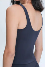 Navy blue halter neck one-piece swimsuit with open back for bust comfort