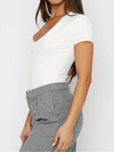 White V-Neck Bodysuit and Gray Pants for Women