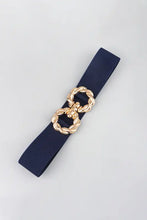 Gold zinc alloy buckle on wide elastic belt with navy strap