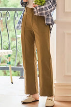 Brown wide-leg cotton pants with buttons and pockets in olive green