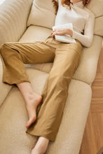 Beige wide-leg relaxed fit pants in mustard yellow, olive green, brown