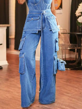 Blue denim wide leg cargo jeans with multiple pockets and a tie waist design for casual wear