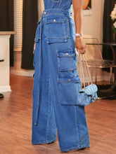 Wide leg cargo jeans in blue denim with multiple pockets and a drawstring waist for a comfortable fit