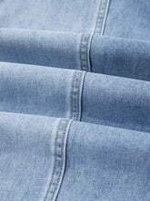 Light-wash denim wide leg drawstring raw hem jeans with subtle fading and reinforced stitching along the seams