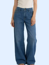 Wide leg washed blue denim jeans with wide-leg cut and classic five-pocket design in cotton material
