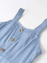 Light blue denim dress with wide strap sweetheart neck and gold-toned buttons on stitched straps