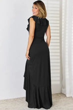 Women’s black sleeveless ruffled maxi dress with moderate stretch and high-low hem