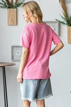 Women’s color block exposed seam t-shirt in pink with blue denim shorts, size options