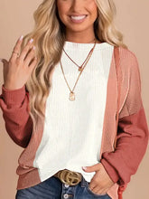 Woman models color block ribbed long sleeve top in white pink rust
