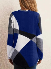 Women’s color block round neck long sleeve tunic sweater in geometric pattern