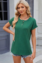 Womens green short sleeve button up t-shirt with stretchy henley detail