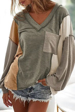 Womens long sleeve color block V-neck top with exposed seam chest pocket