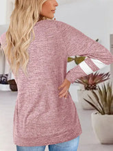 Womens pink long sleeve raglan top with white stripes on sleeves