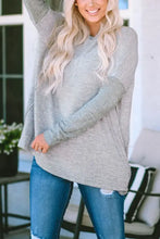 Light gray round neck dropped shoulder sweater with high-low hem