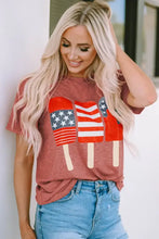 Women’s short sleeve flag round neck T-shirt with patriotic American flag design and blue jeans