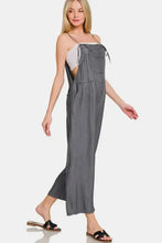 Women’s washed adjustable strap wide leg denim overalls in gray stripes
