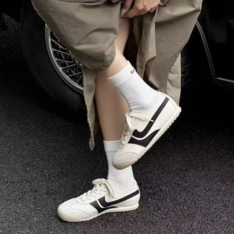 Women's White Athletic Sneakers with Yellow Accents and Black Stripes Black