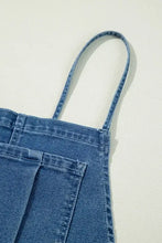 Women’s wide leg denim overalls with adjustable tie straps and denim crossbody bag