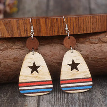 Pair of wooden dangle earrings with cutout star and stripes