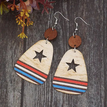 Pair of wooden dangle earrings with cutout star and red white blue stripes