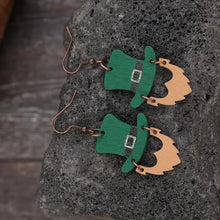 Two green wooden hat shape dangle earrings with beard accents