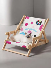 Wooden pet lounge chair with pink polka dots and Keep Happiness text