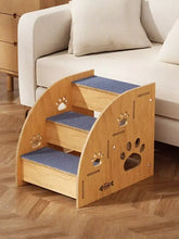 Escalier pour animaux en bois clair avec 3 marches, tapis bleus et côtés avec empreintes de pattes