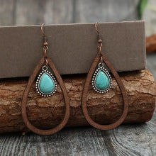 Pair of wooden turquoise cutout teardrop earrings