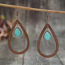 Pair of wooden turquoise cutout teardrop earrings with teardrop stones